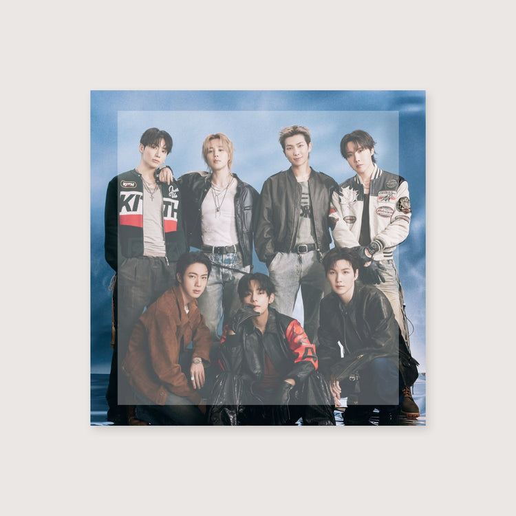 A square wall art print or poster featuring a group photo of seven young men posing together against a blue-toned backdrop. The print is centered on a light beige background.