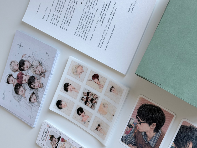 Past ATEEZ Mailclub editions laid out together