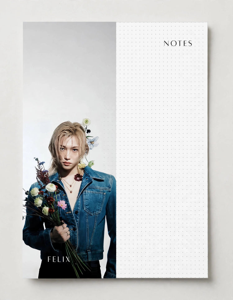 Notepad featuring Felix of Stray Kids holding flowers in a printed design, ideal for writing notes, reminders, and lists.