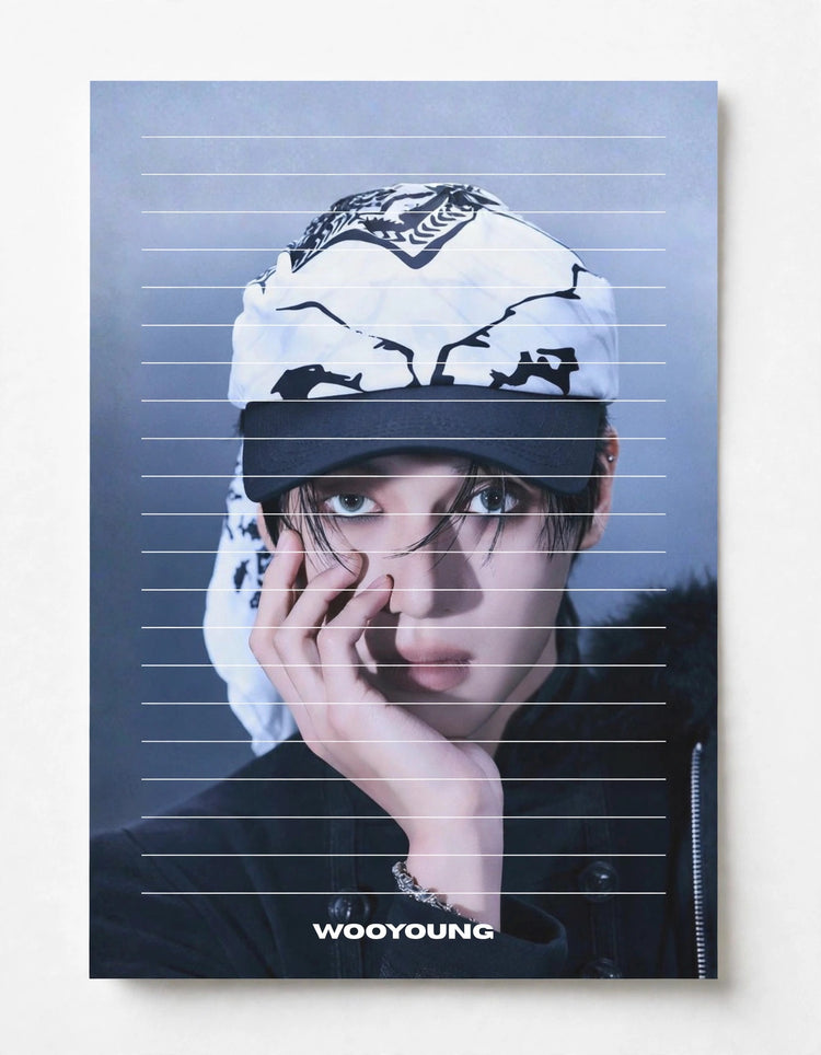 A vertical poster or print featuring a close-up portrait of a person wearing a white patterned cap and dark clothing, with the name 'WOOYOUNG' printed at the bottom. The artwork is shown against a light neutral background with a subtle drop shadow.