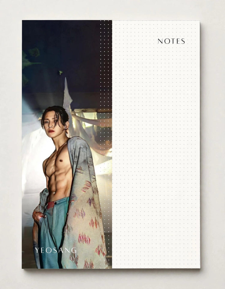 A notebook or planner cover design with a split layout: the left side features a portrait of a shirtless man draped in patterned fabric, and the right side is a white dotted grid area labeled NOTES. The name YEOSANG appears at the bottom left.