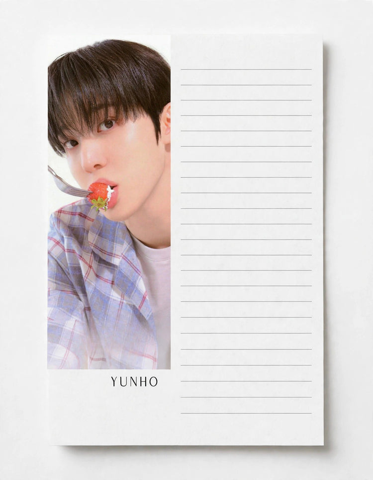 A personalized lined notepad featuring a printed photo of a young man on the left and blank horizontal lines on the right, with the name 'YUNHO' printed below the photo.
