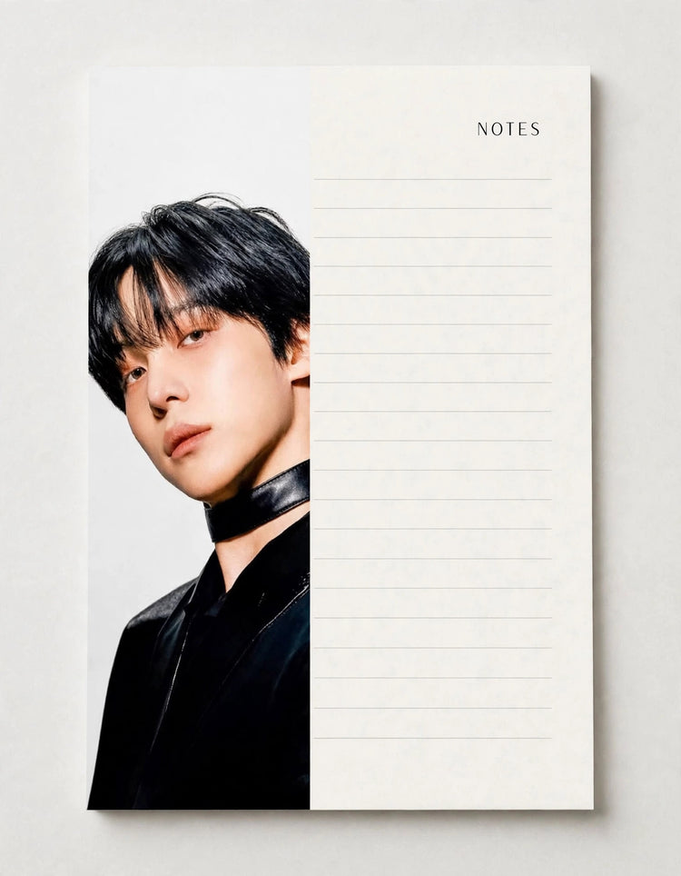 A vertical notepad with a split design: the left half features a portrait of a young man in black clothing, and the right half is an off-white lined writing area labeled 'NOTES' at the top.